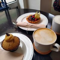 Vanilla muffin and chocolate tarte with cappuccinos at Odete Bakery in Porto