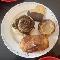 Cinnamon roll, húngaros, pastel de nata, pain au chocolat at Odete Bakery in Porto