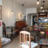 Really lovely seating and view of the street from the window; so many options for baked goods at Odete Bakery in Porto