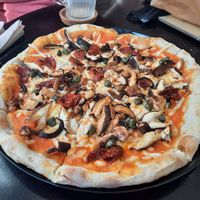 Shiitake pizza with sundried tomato and capers at Odete Bakery in Porto