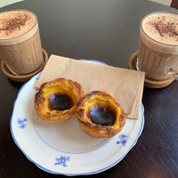 Vegan pastel de nata and hot chocolate. A heavenly treat!  at Odete Bakery in Porto