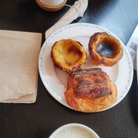 Pastel de natas, pain au chocolait and cappuccinos at Odete Bakery in Porto