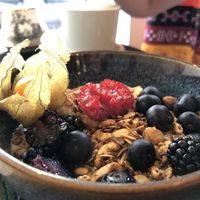 Yogurt bowl with fresh fruits  at Odete Bakery in Porto