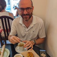 "Egg" tart and coffee at Odete Bakery in Porto