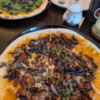 I usually make my own vegan pizza and I'm good but this was better. I drizzled some olive oil and a little of the spice sauce. Just lovely at Odete Bakery in Porto