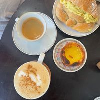 Filled Brioche Croissant, Pastel de Nata, Cappuccino and Espresso at Odete Bakery in Porto