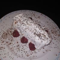 Guava cake with raspberries at Odete Bakery in Porto