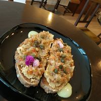 Eggplant spread on toast with capers at Odete Bakery in Porto