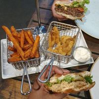 Zero chucks chicken Burger and Impossible urge double (swap out cheese for vegan cheese and special sauce for vegan special sauce) and onion rings and sweet potato fries with vegan at Burger Urge in Smithfield
