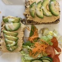 Hummus on sourdough with added avocado  at The Fragrance of the Heart in Oslo