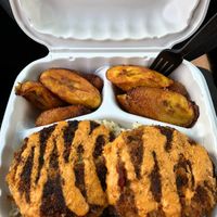 Crab cakes with rice and plantains  at Desmond's Island Soul Grill in Virginia Beach