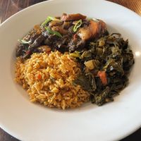 Oxtail style mushrooms, yellow rice, and collards  at Desmond's Island Soul Grill in Virginia Beach