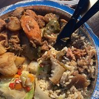 Brown stewed jackfruit, rice and peas, cabbage and plantains  at Desmond's Island Soul Grill in Virginia Beach