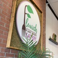 Sign at Flourish Plant-Based Eatery in Evansville