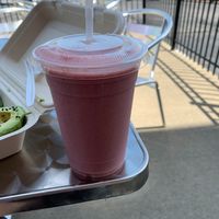 vegan strawberry banana smoothie! Tastes like a milkshake! So good! at Flourish Plant-Based Eatery in Evansville