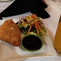Samosa with mango juice at Om in Montreal