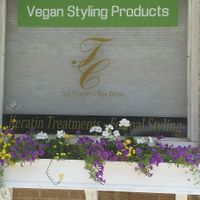 Store front at True Concepts Hair Design in Red Bank