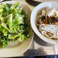 Local noodle dish served with greens at Huong Tu Bi in Hoi An