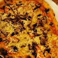 Vegan Pizza with four topping options (around 11€) at Pizzeria Napoli in Puerto Natales