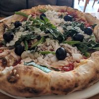 Vegan pizza with vegan cheese and 4 selected vegetable toppings at Pizzeria Napoli in Puerto Natales