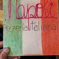 Menu cover at Pizzeria Napoli in Puerto Natales