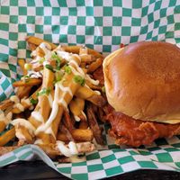 Fried chicken sandwich with loaded fries at The Fix in Kansas City