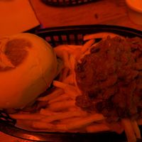 Horrible photo of a delicious burger with chili fries at The Winston in Hobart