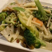 A Little Green Curry on Top  at Salaya Plant-Based Kitchen in Los Angeles
