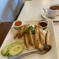 KHO MUN GAI
Deep fried battered chicken with ginger garlic rice, tamarind black bean sauce served with cucumber slices  at Salaya in Los Angeles