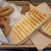 Panini and onion rings at Loving Hut in Louvain-la-neuve