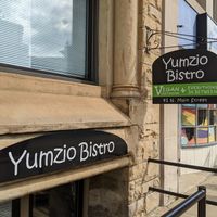 Signs at Yumzio Bistro in Greensburg