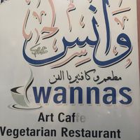 Outside signboard at Wannas Art Cafe in Luxor