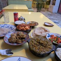 shakshouka, lentil dhal, fried cauliflower with rice, bread and salad at Wannas Art Cafe in Luxor
