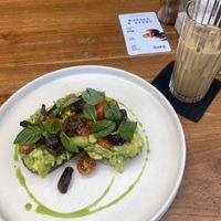 Amazing avo toast and almond ice latte  at Suka Espresso in Ubud