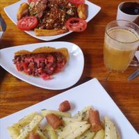 Chaulafan (on thr top), tacos vegan and salchipapas (bottom) at Govinda Gopal - Govindas  in Quito