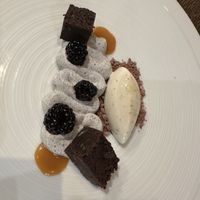 Brownies w miso caramel, pine ice cream, smoked blackberries and black sesame cream   at Paradiso Pure Living Vegan Hotel in Kastelruth