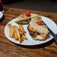Vegan burger and chips at Chia Lounge in Morjim