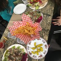 Falafel salad and SAJ pita plater with fries  at Falafel Scoop in Ottawa