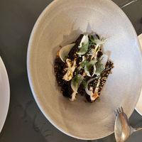 Serving to share with partner   at Neue Taverne in Zurich