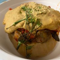 Stuffed butternut squash with cashew cheese sauce at The Organic Deli & Market in Buenos Aires