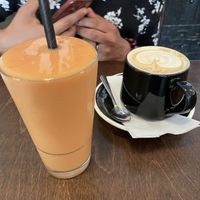Mango smoothie and latte with oat milk  at Café Pékoe in Quebec