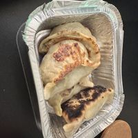 Fried Dumplings. Good but burnt  at Amitabha Vegan in Fresh Meadows