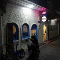 Look for the blue door at Sugam Vegetarian in Bangkok