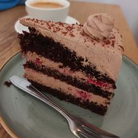 Layer cake with chocolate and raspberries at Cafe Vux in Berlin