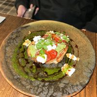 Pea guacamole, sourdough toast, oven dried tomatoes & crumbled almond feta  at Nant Y Felin in Denbigh