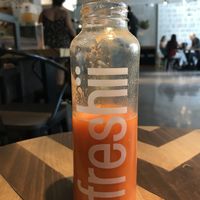 Reviiv (soooo delicious! Carrot, ginger, tumeric, pineapple)  at freshii in Lima