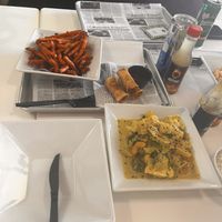 Spring rolls, veggie curry, and sweet potato fries   at Sabia Plant Based Eatery in Guaynabo