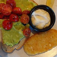 Avo on toast, vegan aioli, hash brown at The Coffee Club in Warwick