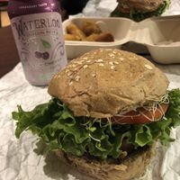 Beyond Burger and a whole wheat bun ♥️So yum!! Love the sprouts too!! at Down to Earth - Store and Deli in Kahului