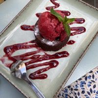 Vegan chocolate cake - souffle! Insanely delicious. Topped with sorbet.  at Smokvica - Kralja Petra in Belgrade